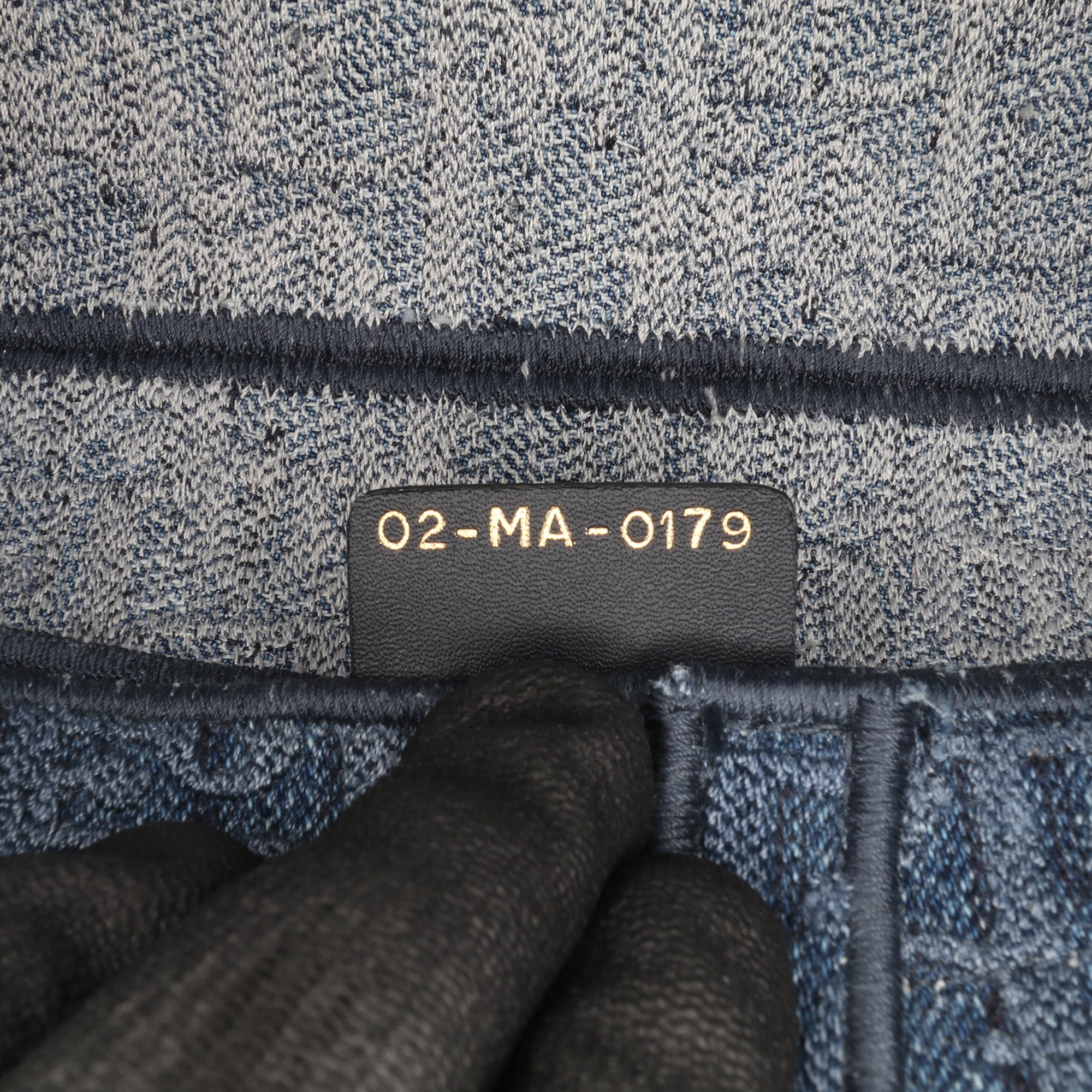 Oblique Embroidered Denim Saddle Bag