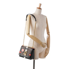 Monogram Epi Trunk Twist MM