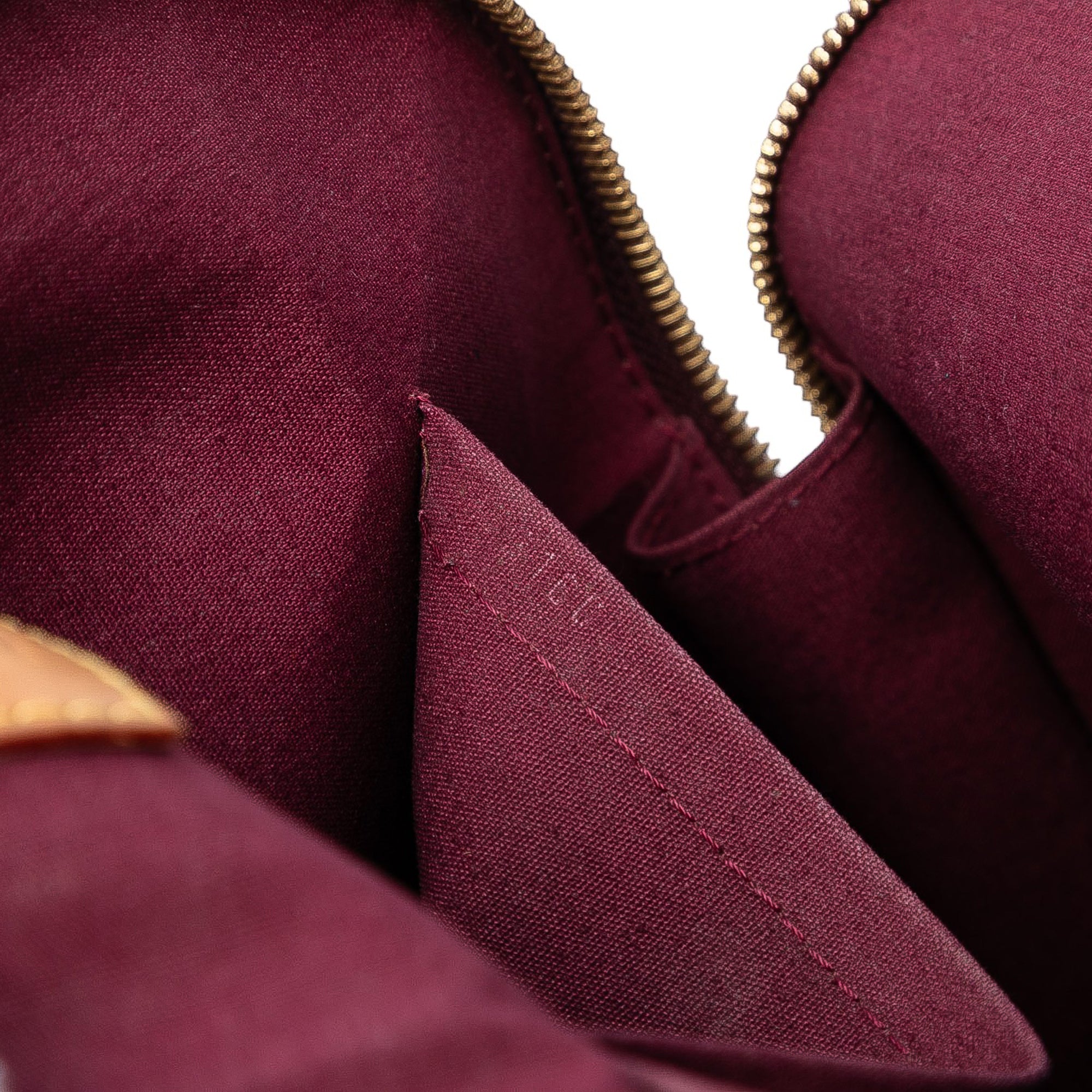 Monogram Vernis Alma PM