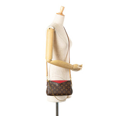 Monogram Pallas Clutch