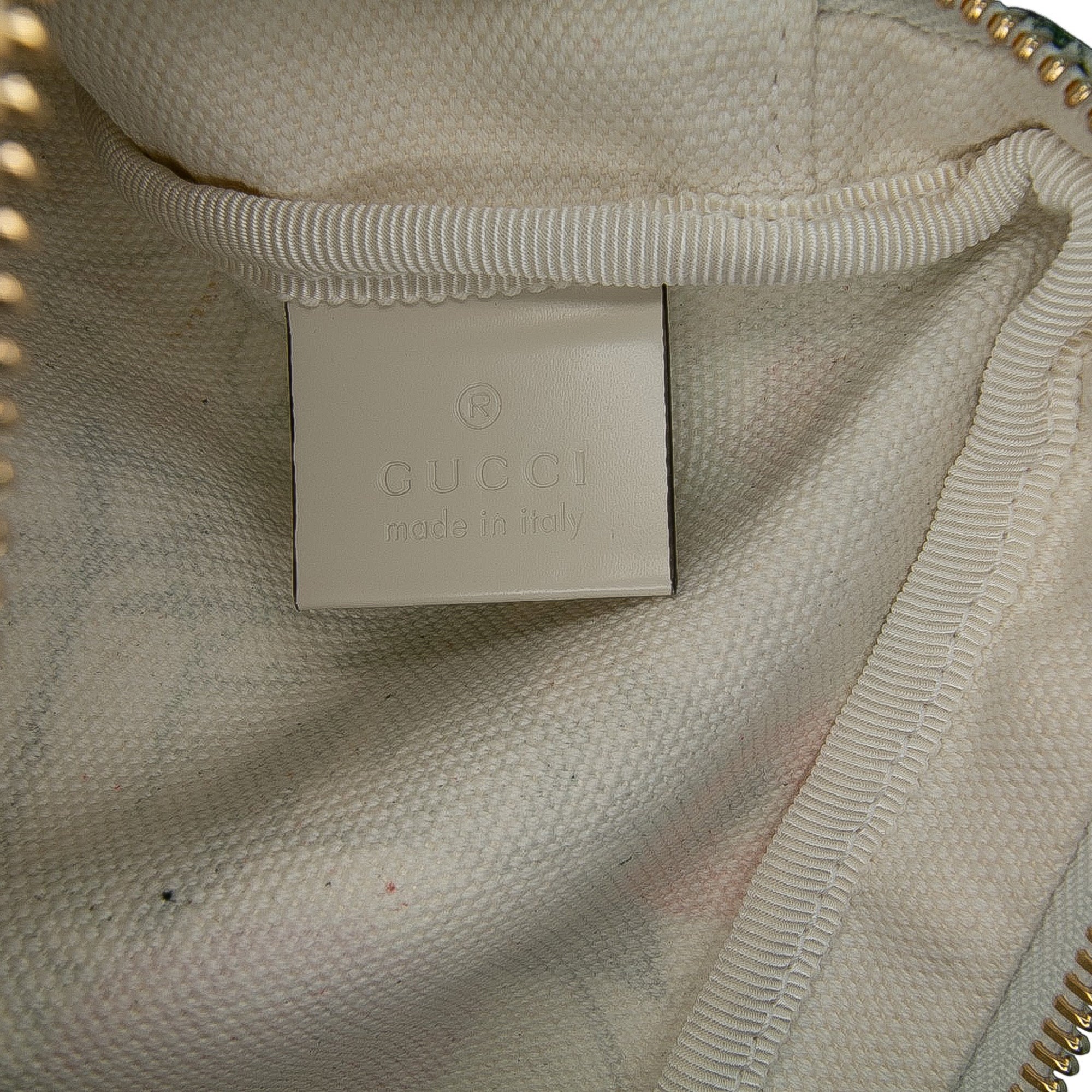 Cutout Leather and Flora Canvas Infinity Crossbody