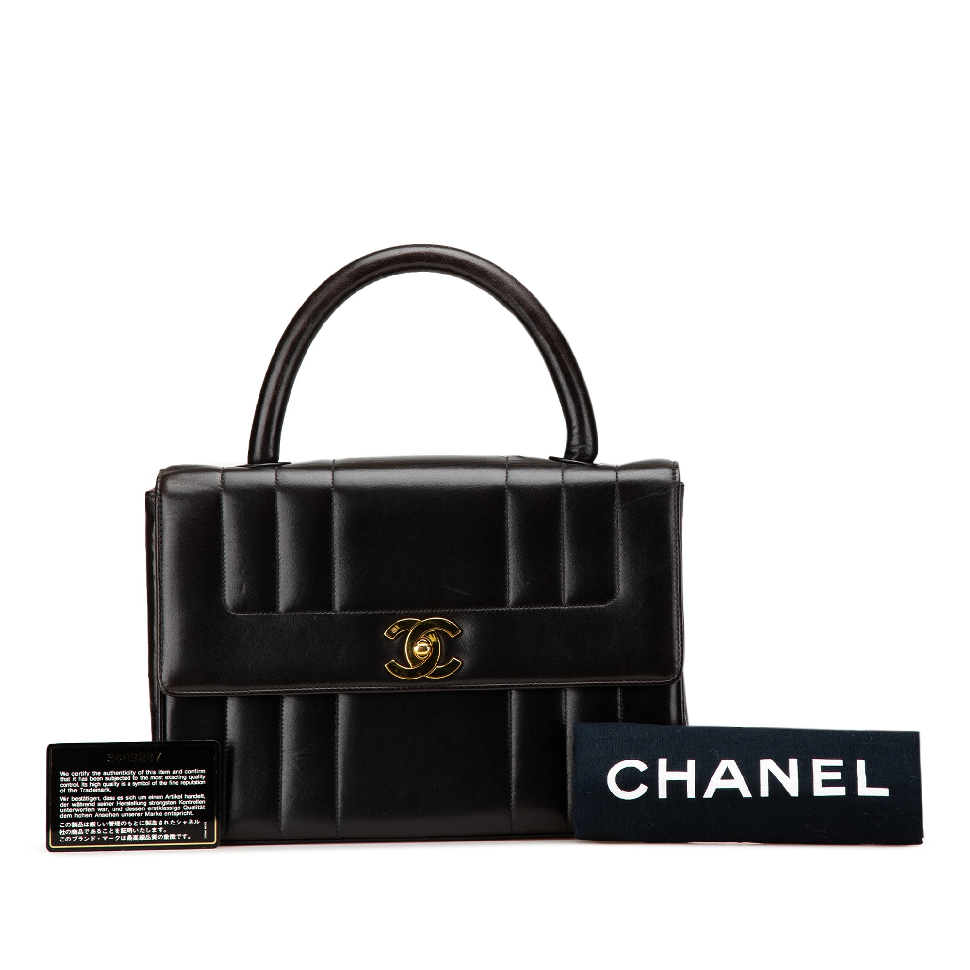 Lambskin Mademoiselle Kelly Top Handle Bag