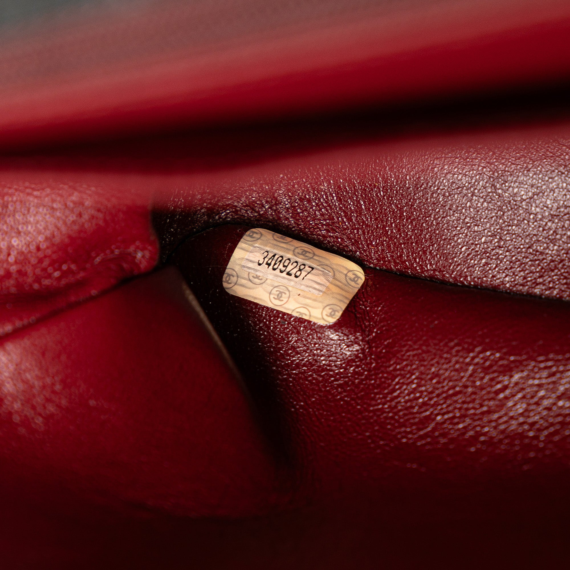 Lambskin Mademoiselle Kelly Top Handle Bag
