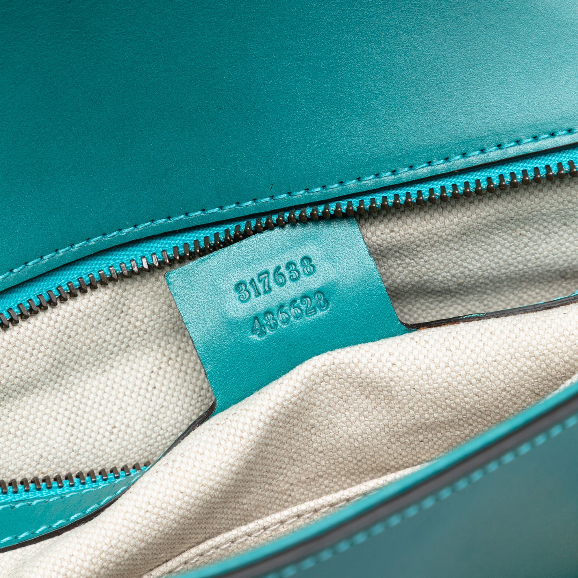 Calfskin Bright Bit Clutch