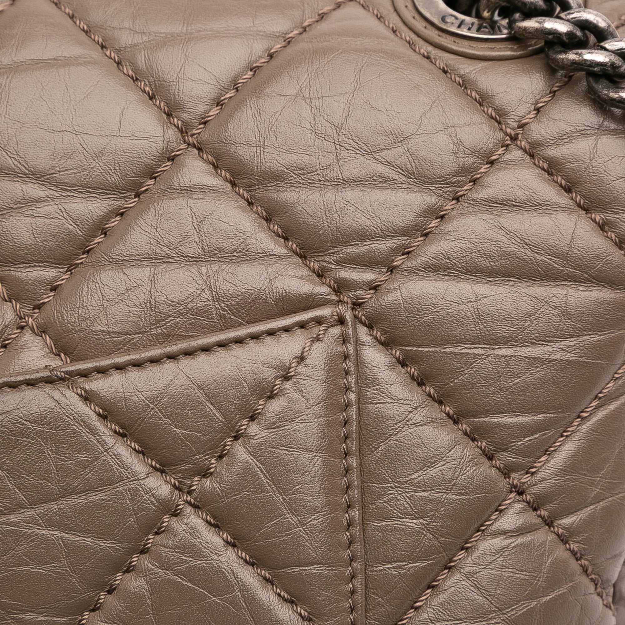 Medium Quilted Aged Calfskin Portobello Flap