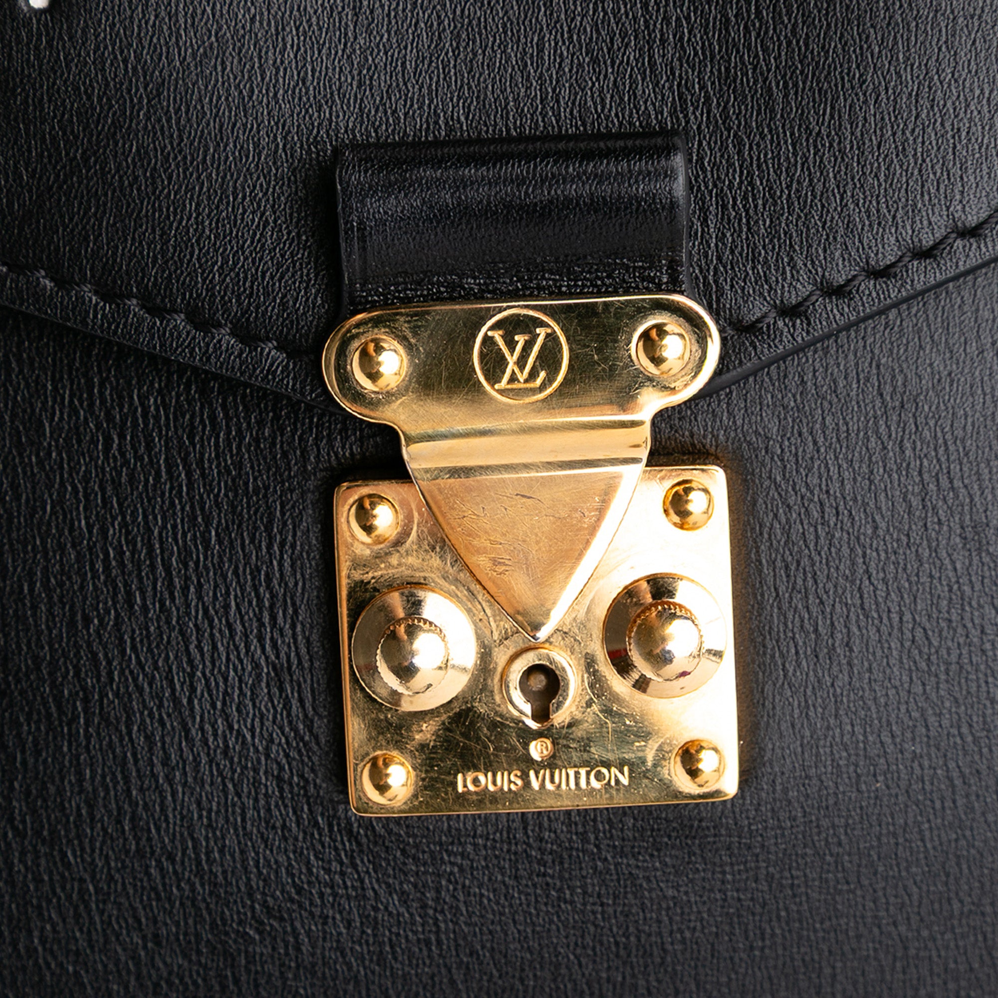 Monogram Brogue Pochette Metis