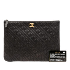 Medium Quilted Caviar O Case Clutch