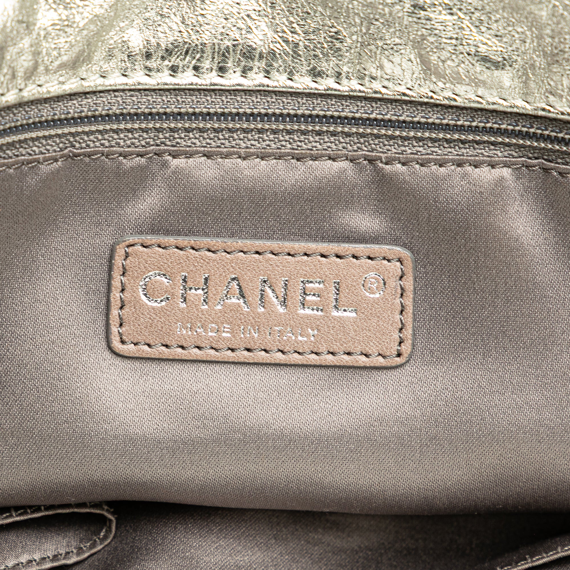 Medium Metallic Glazed Calfskin Perforated Rodeo Drive Satchel