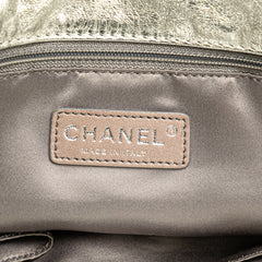Medium Metallic Glazed Calfskin Perforated Rodeo Drive Satchel