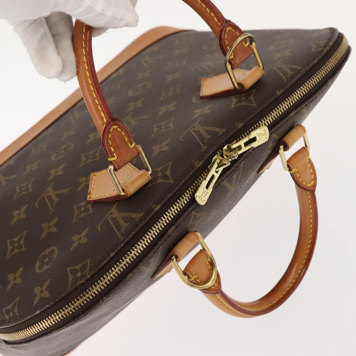 Louis Vuitton Alma Handbag Monogram Canvas