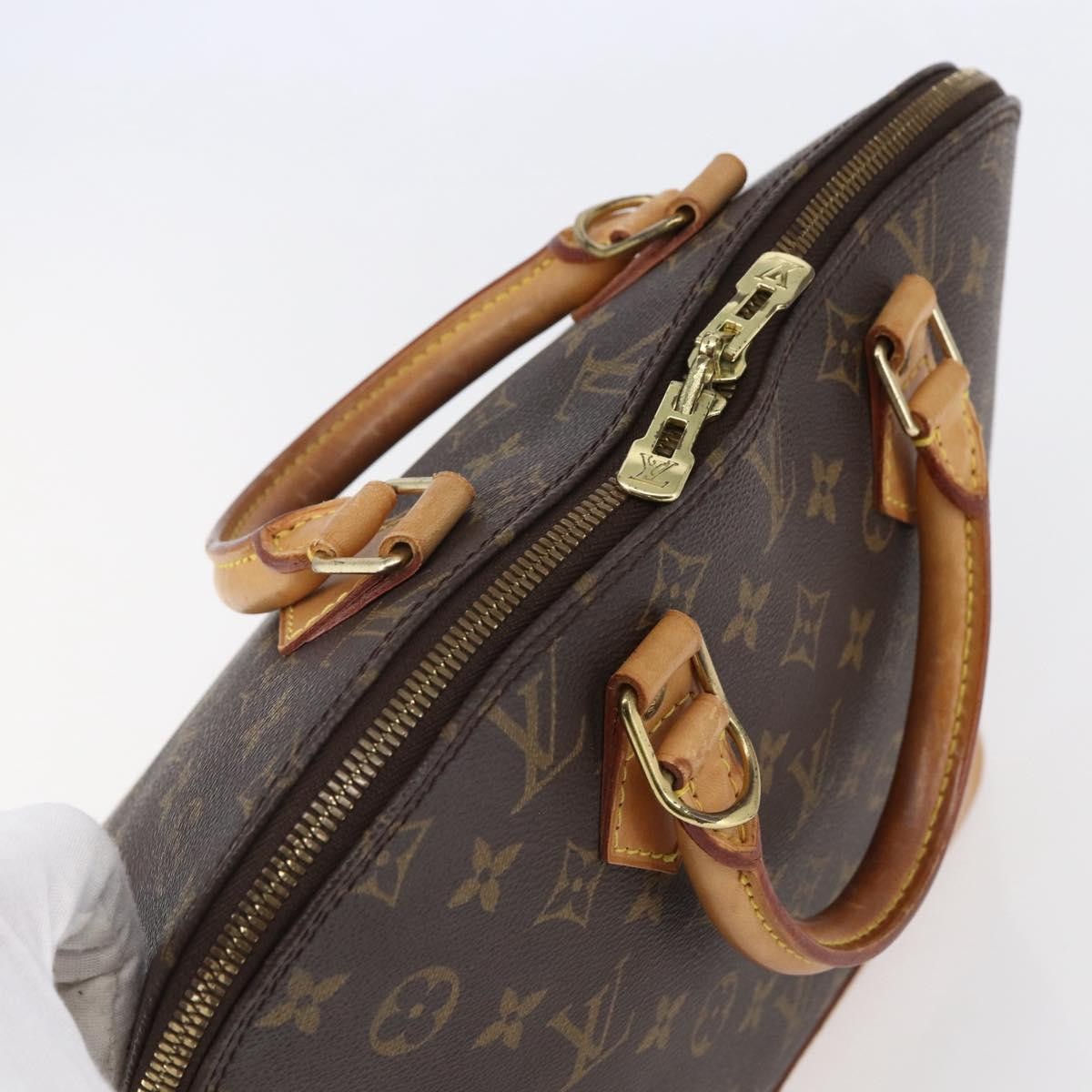 Louis Vuitton Alma Handbag Monogram Canvas