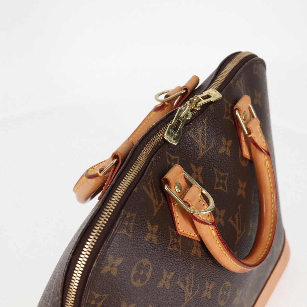 Louis Vuitton Alma Handbag Monogram Canvas