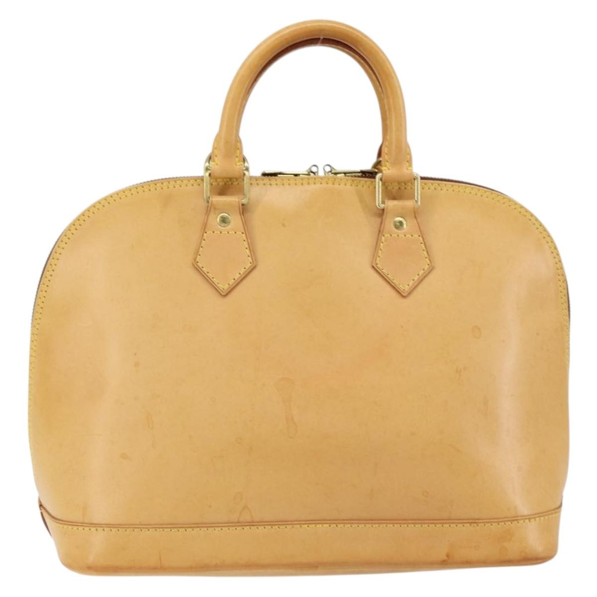 Louis Vuitton Alma Handbag Nomade Leather