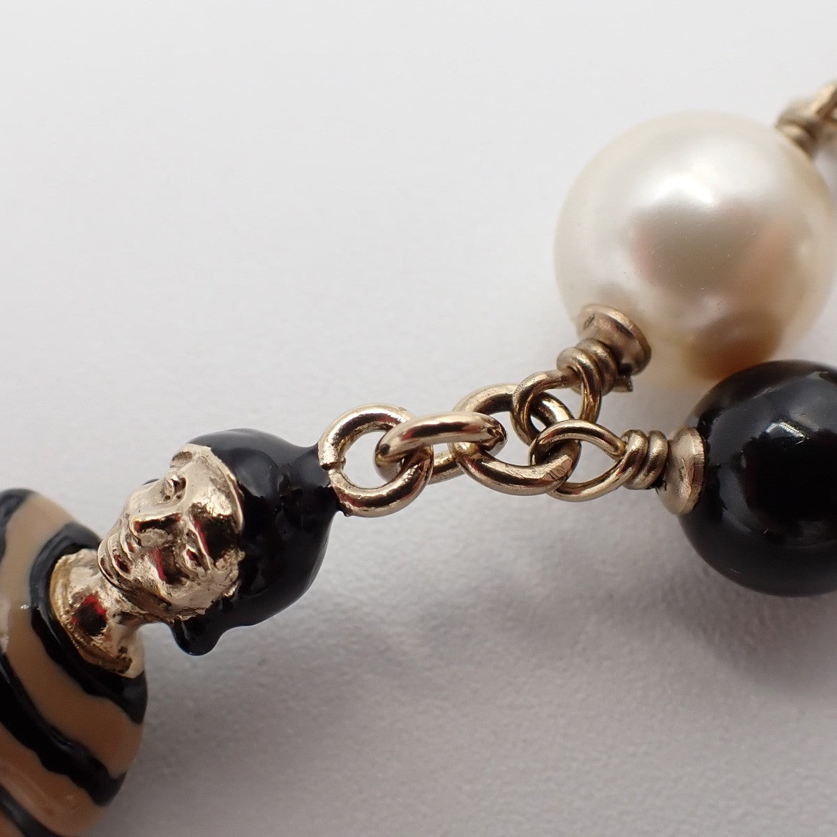 Chanel CC Coco Mademoiselle Figurine Pendant Necklace Metal with Faux Pearl and Enamel