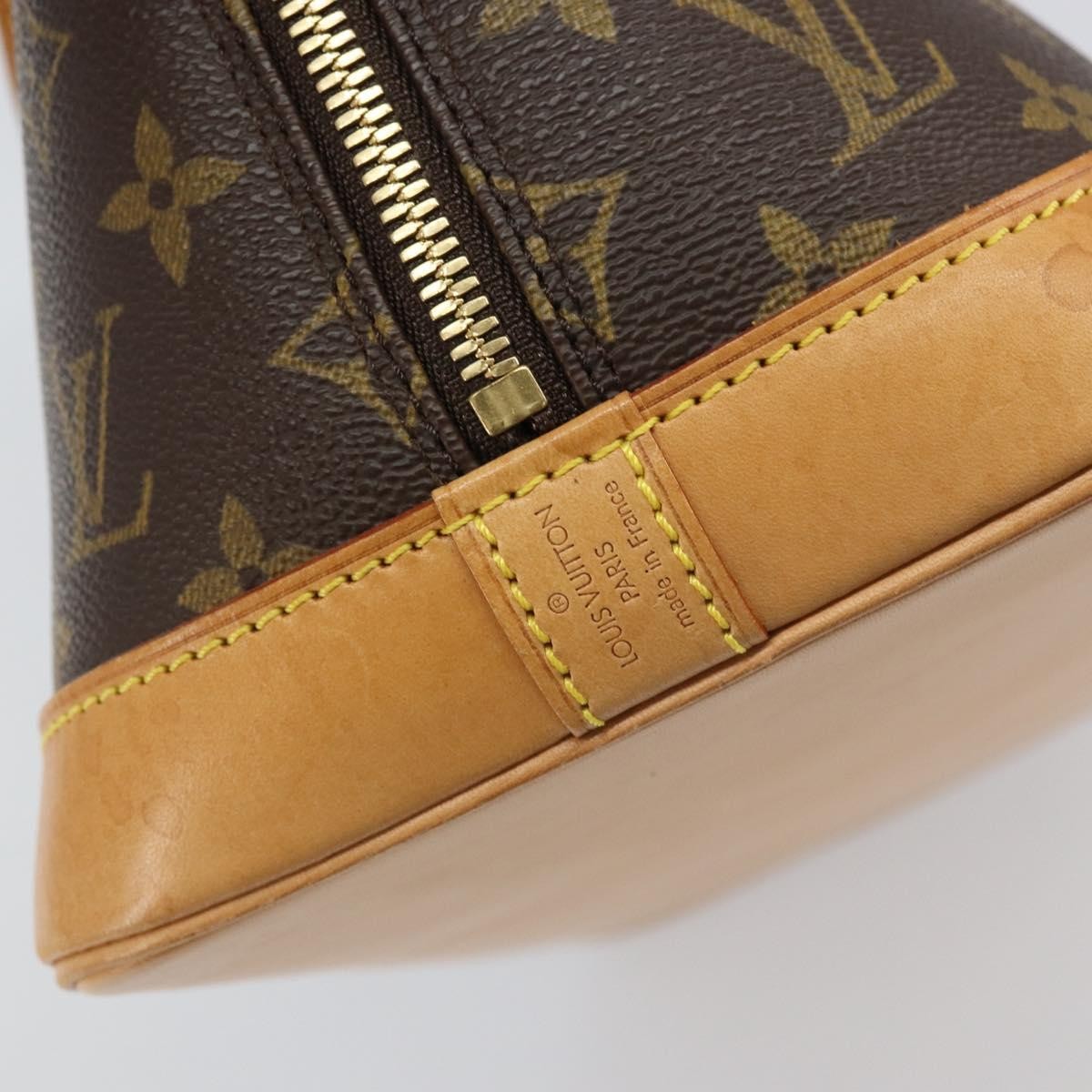 Louis Vuitton Alma Handbag Monogram Canvas