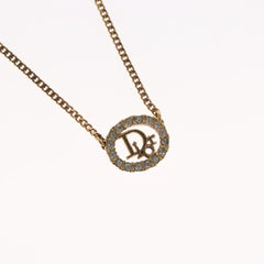 Christian Dior Vintage Logo Round Pendant Necklace Metal and Crystals