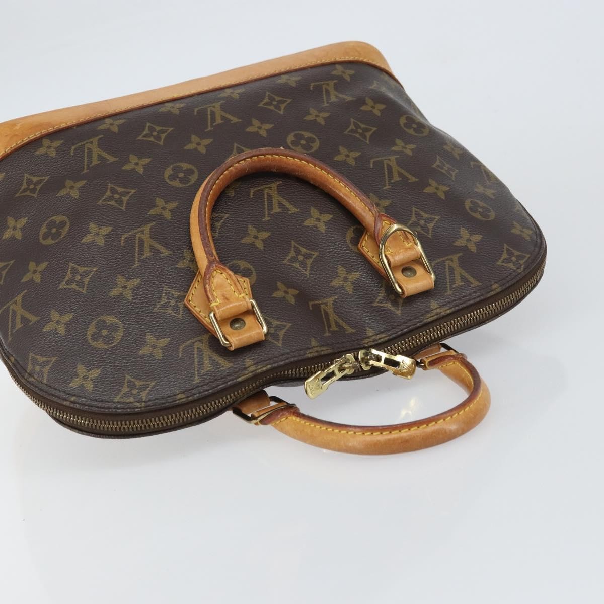 Louis Vuitton Alma Handbag Monogram Canvas