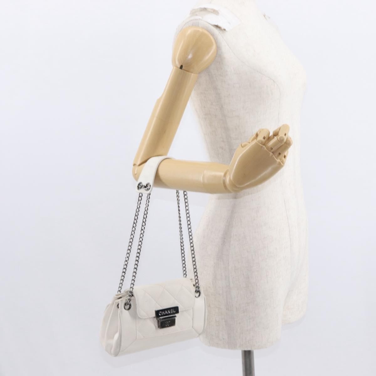 Chanel Accordion Push Lock Flap Bag Quilted Caviar