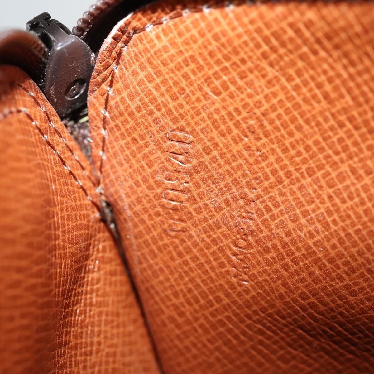 Louis Vuitton Pochette Secret Monogram canvas