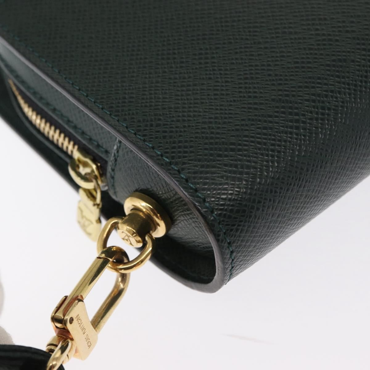 Louis Vuitton Pochette Baikal Clutch Taiga Leather