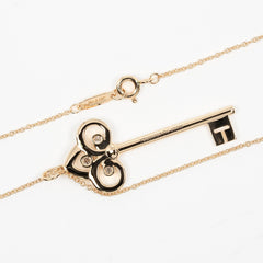 Tiffany & Co. Fleur de Lis Key Pendant Necklace 18K Pink gold and Diamonds