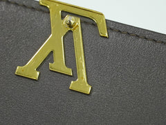 Louis Vuitton Capucines Compact wallet Leather