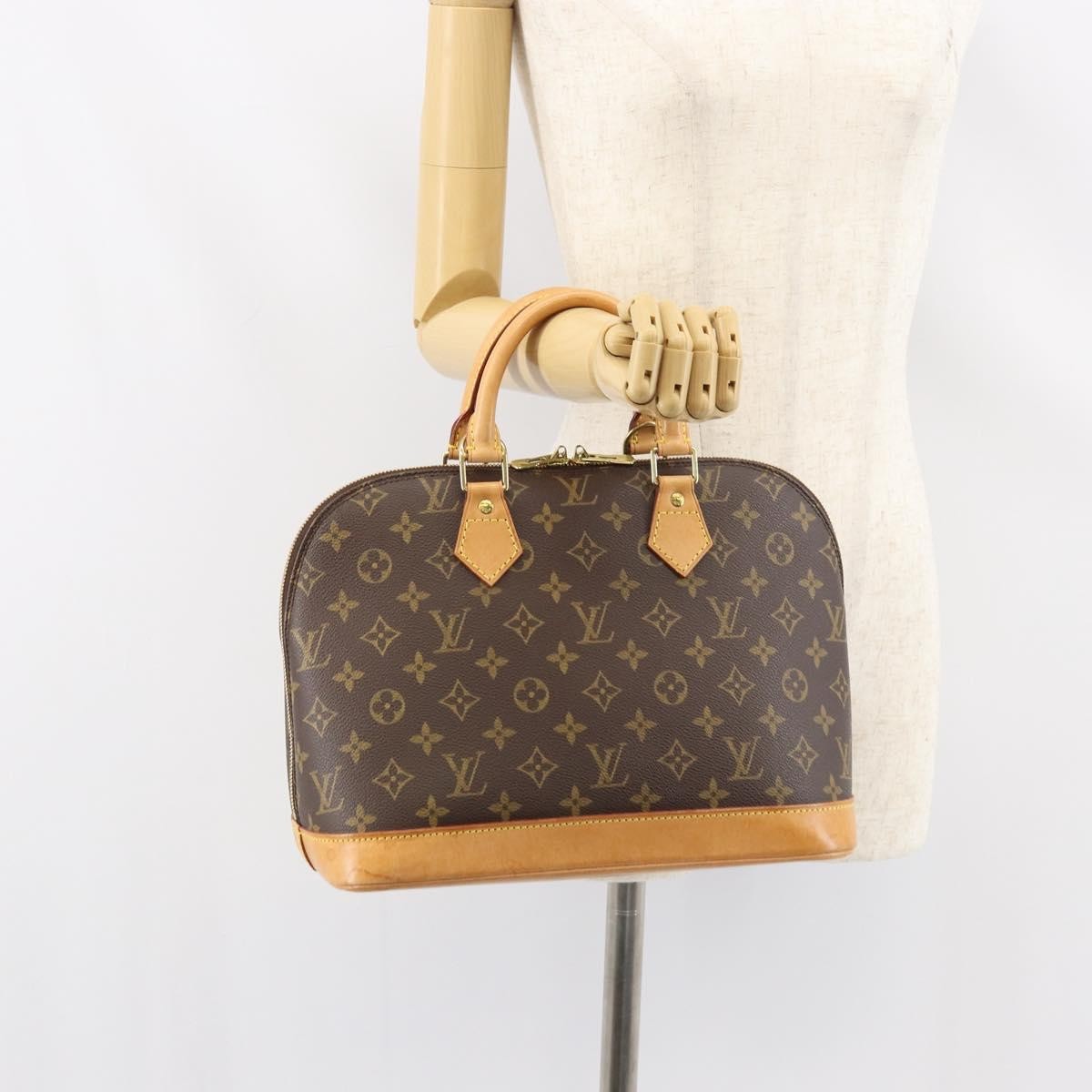 Louis Vuitton Alma Handbag Monogram Canvas