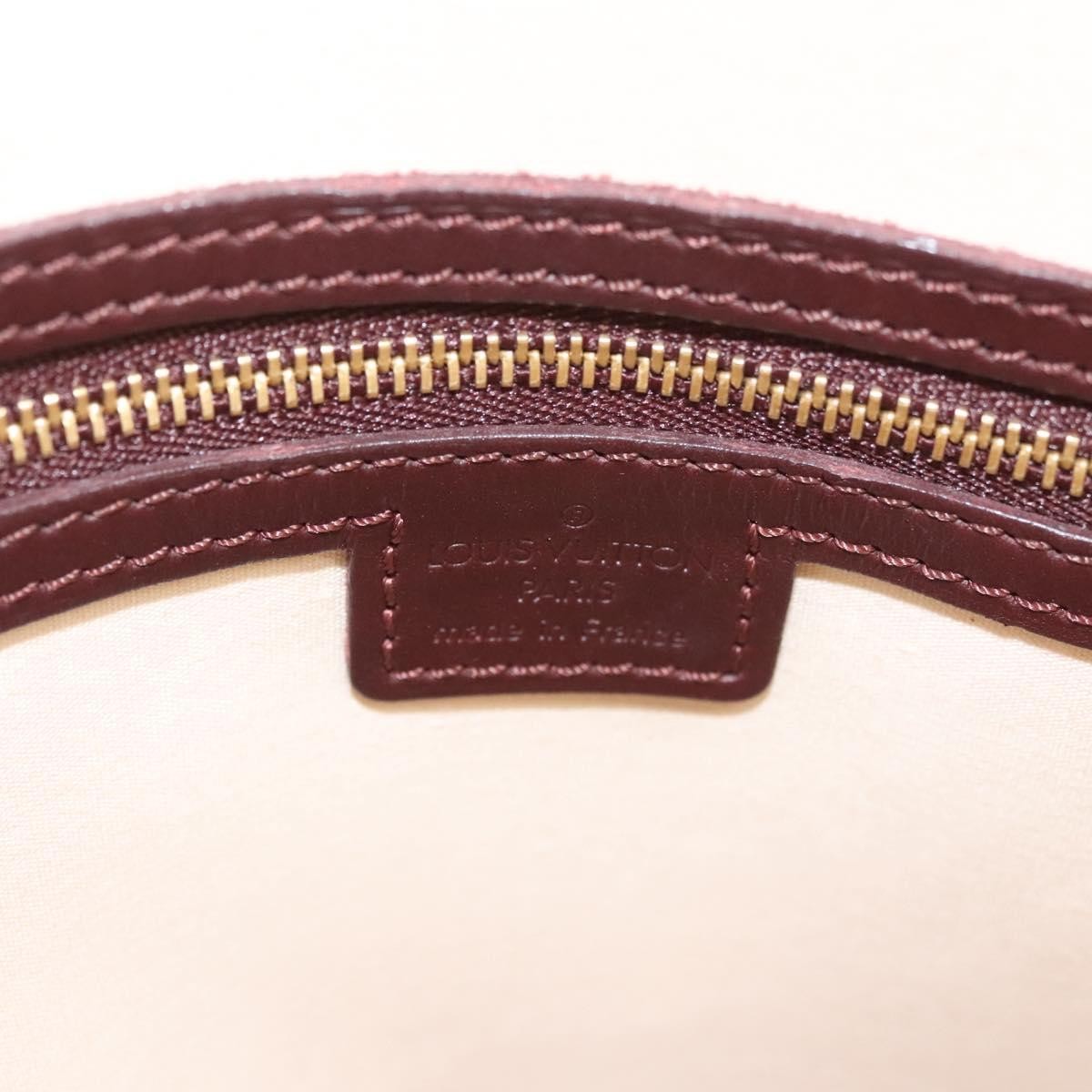 Louis Vuitton Alma Handbag Mini Lin