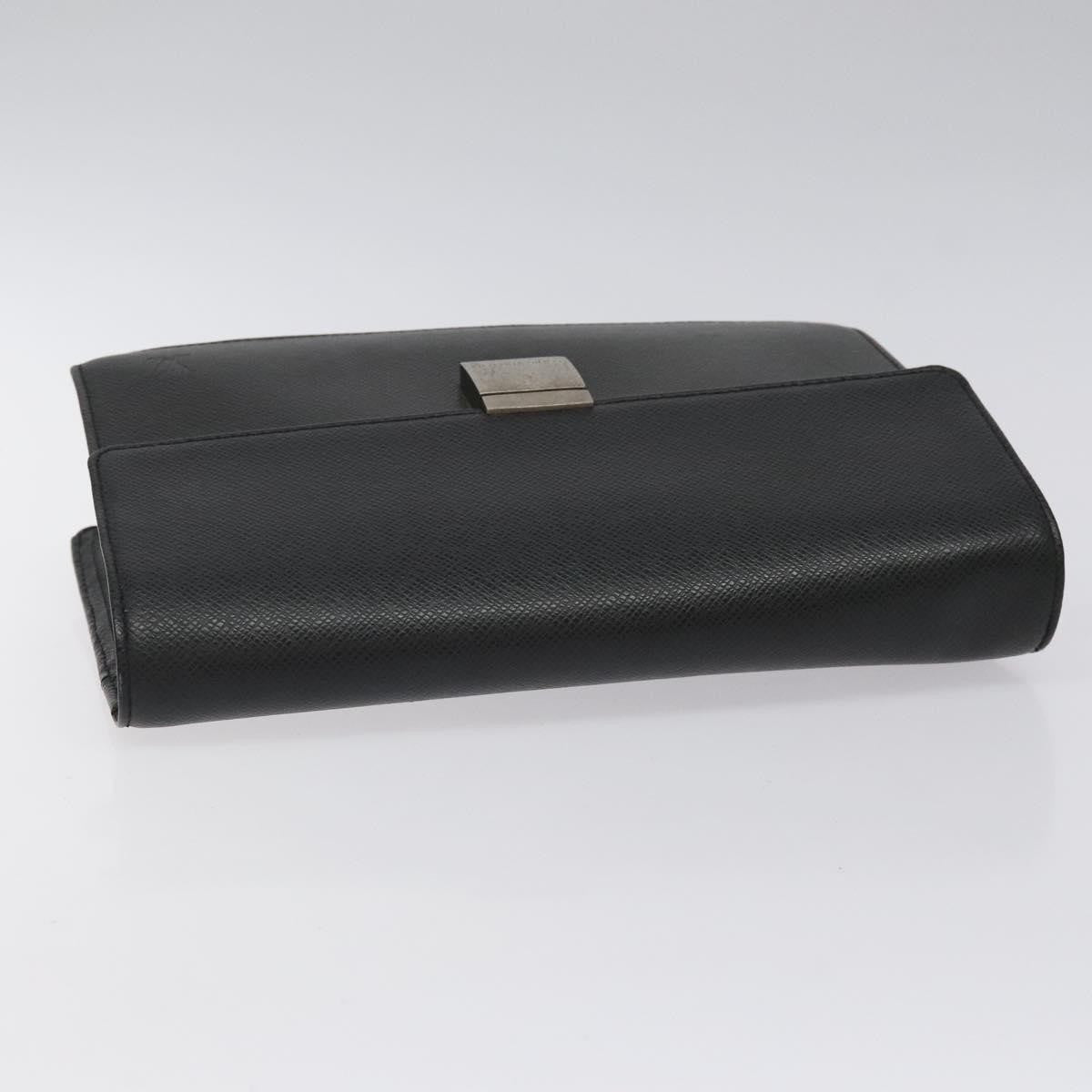 Louis Vuitton S Lock A4 Wristlet Pouch Macassar Monogram Canvas