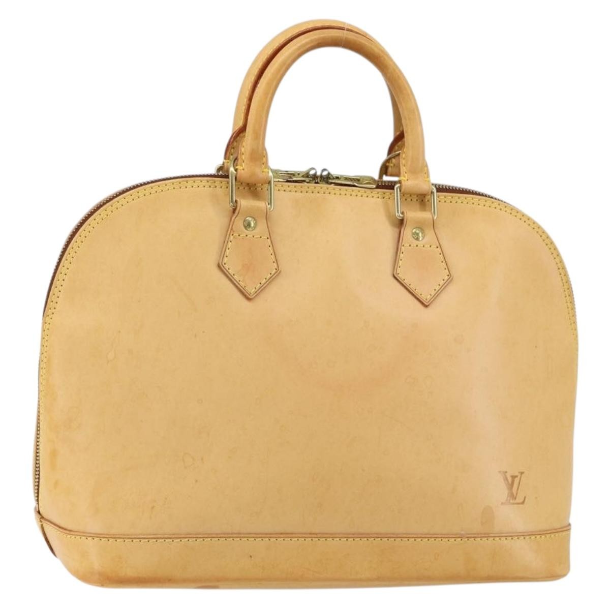 Louis Vuitton Alma Handbag Nomade Leather