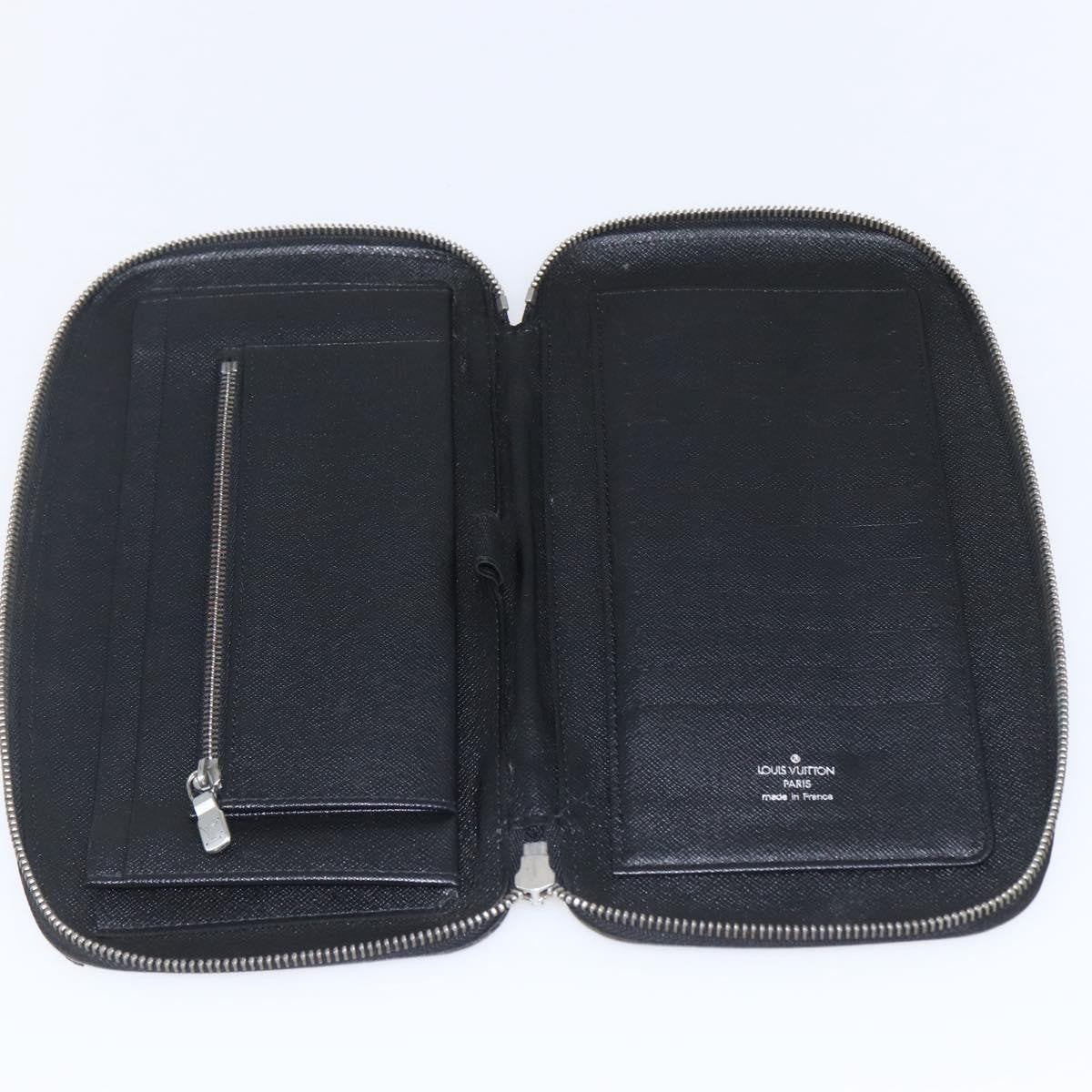 Louis Vuitton Atoll Organizer Wallet Taiga Leather