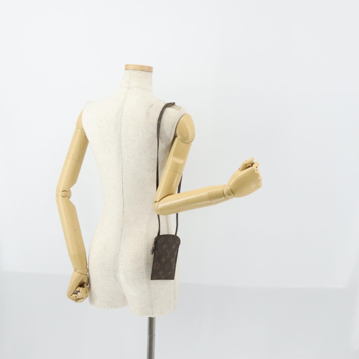 Louis Vuitton Pochette Secret Monogram canvas