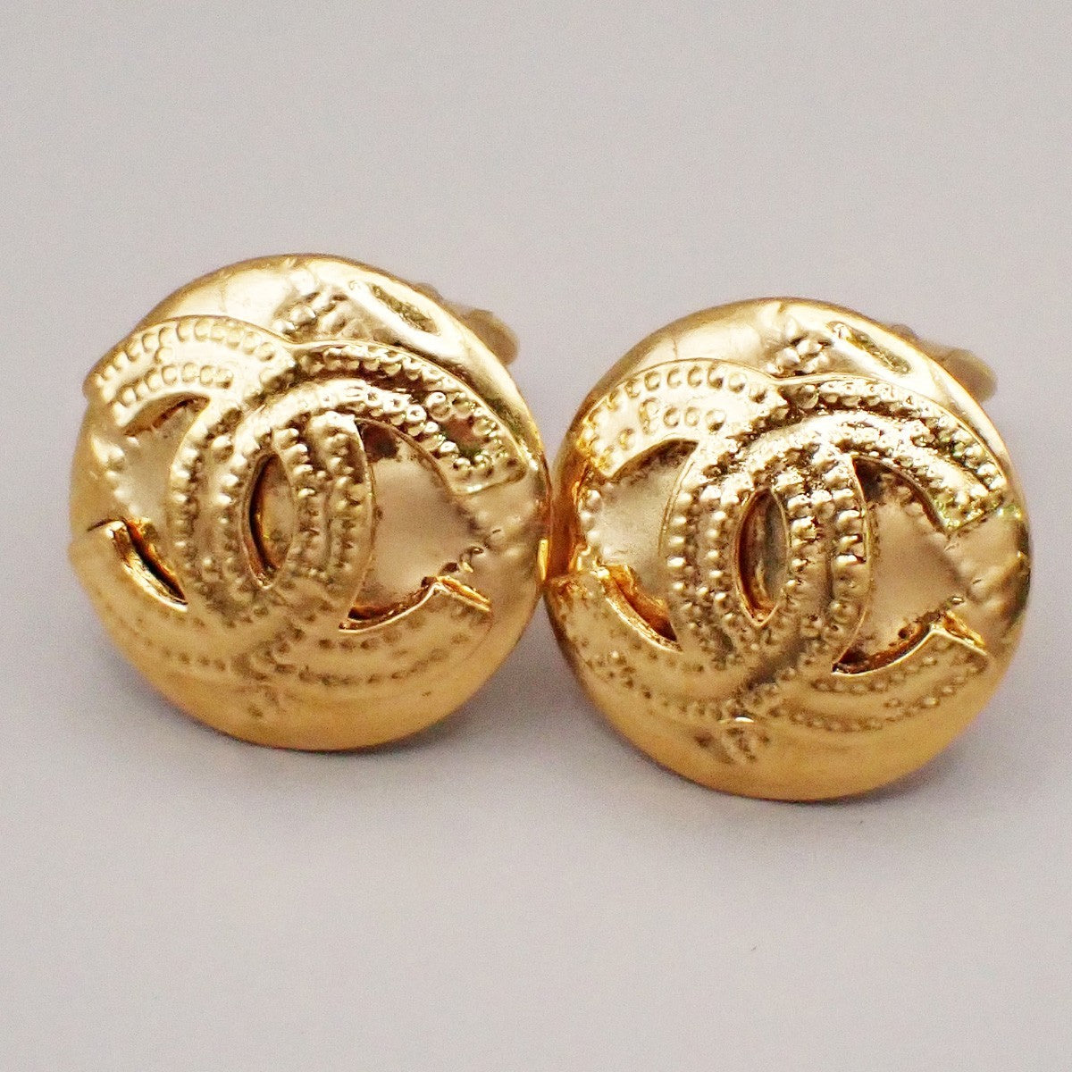 Chanel Vintage CC Logo Round Clip on Earrings Textured Metal