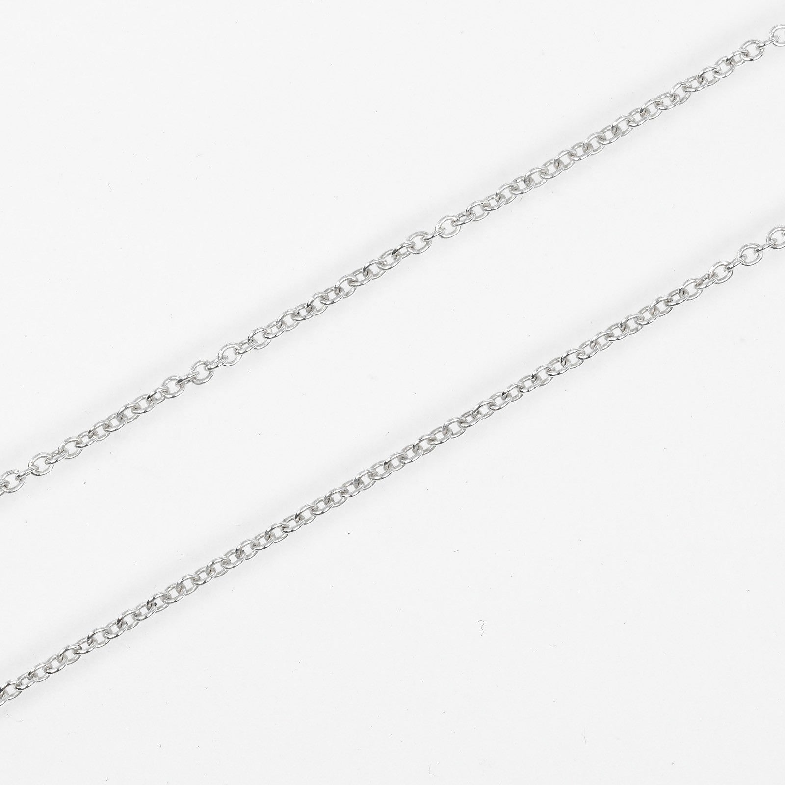 Tiffany & Co. Elsa Peretti Open Heart Pendant Necklace Sterling Silver with Pink Sapphire