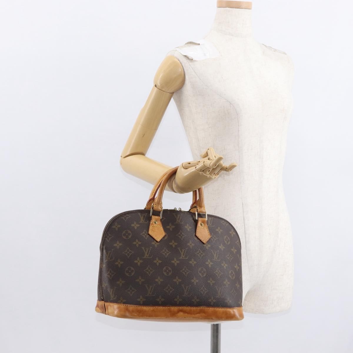 Louis Vuitton Alma Handbag Monogram Canvas