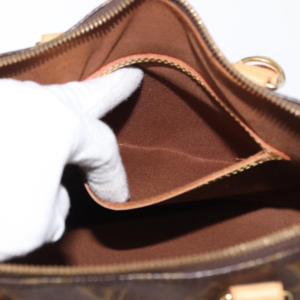 Louis Vuitton Alma Handbag Monogram Canvas