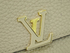 Louis Vuitton Capucines Compact wallet Leather