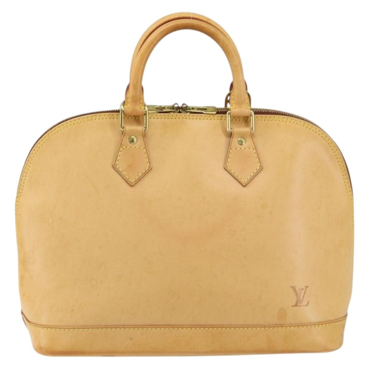 Louis Vuitton Alma Handbag Nomade Leather