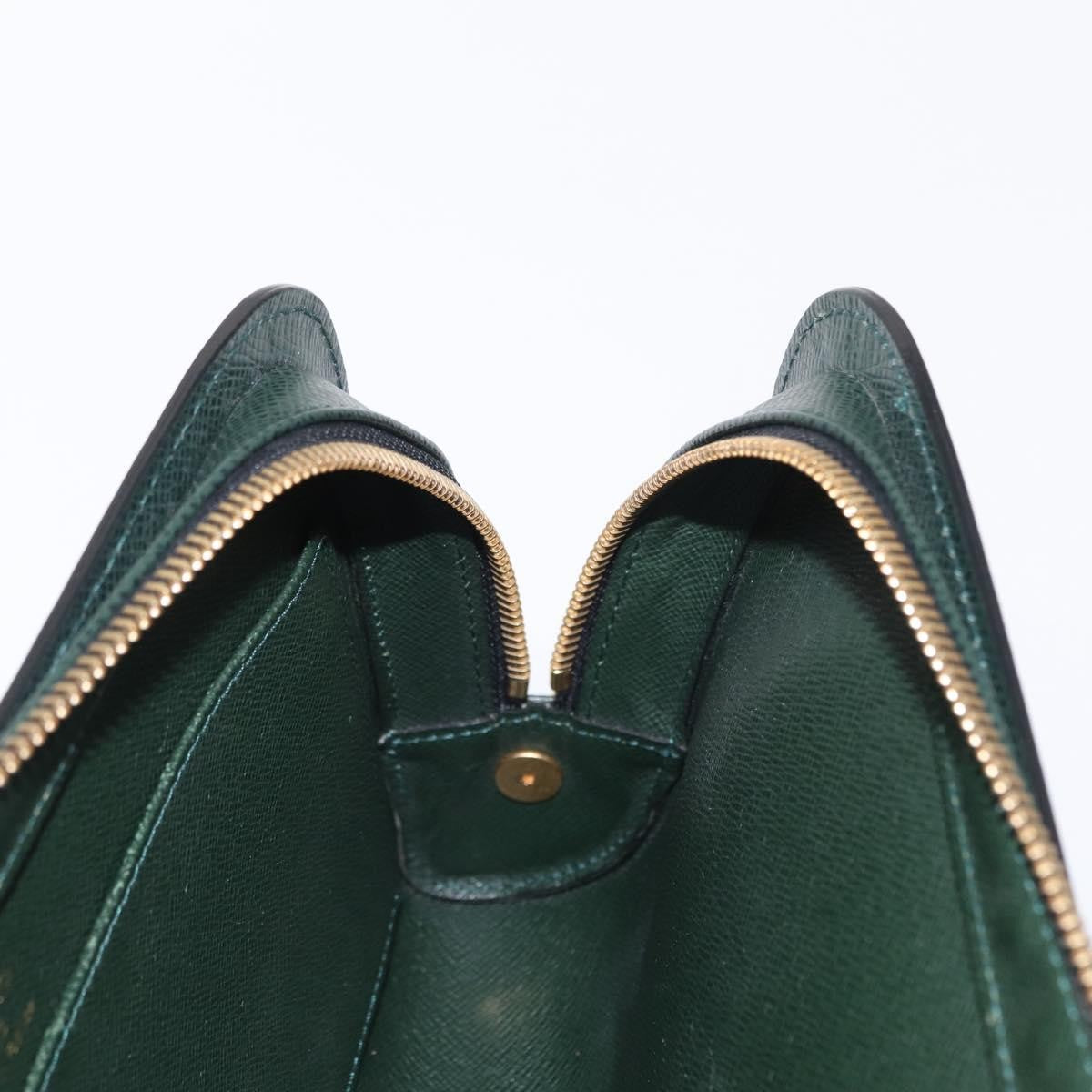 Louis Vuitton Pochette Baikal Clutch Taiga Leather