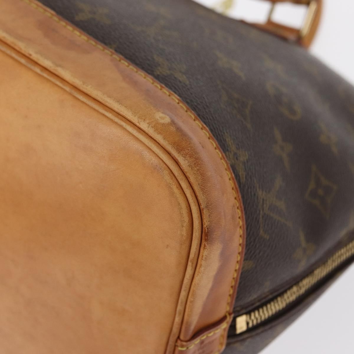 Louis Vuitton Alma Handbag Monogram Canvas