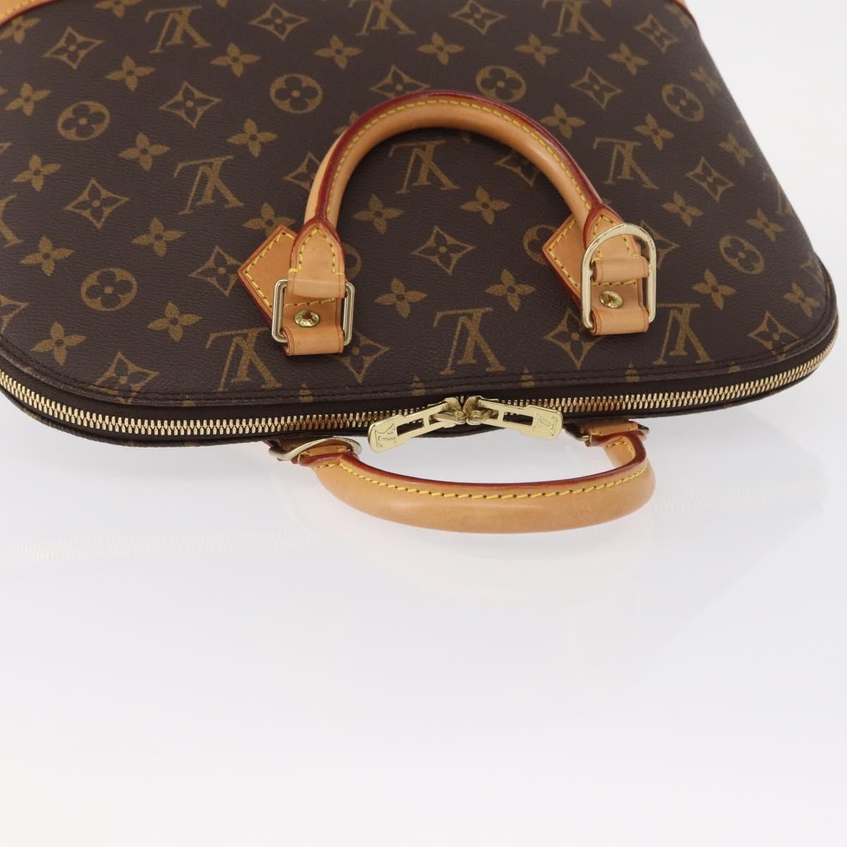 Louis Vuitton Alma Handbag Monogram Canvas