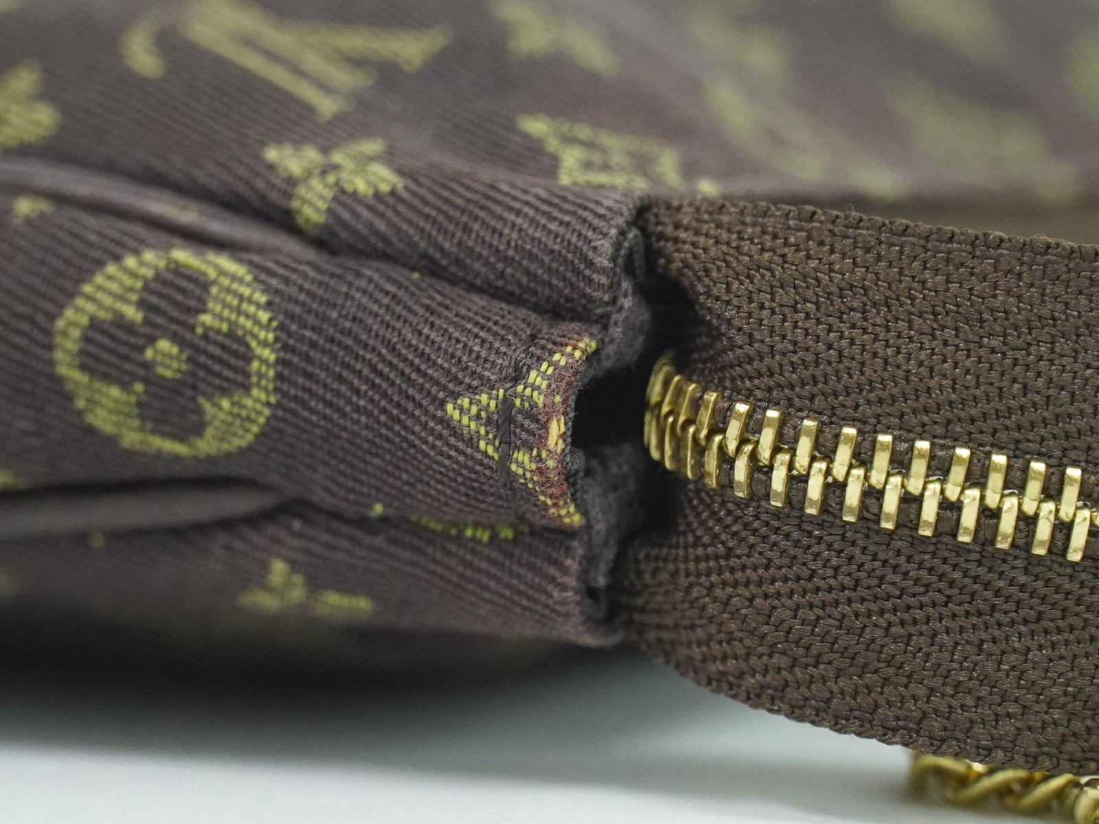 Louis Vuitton Mini pochette accessoire Min Lin Canvas