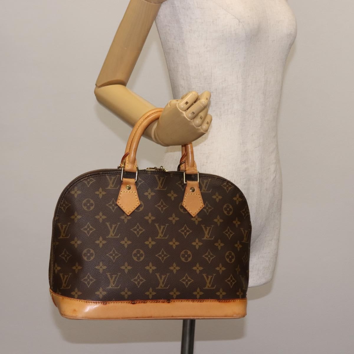 Louis Vuitton Alma Handbag Monogram Canvas