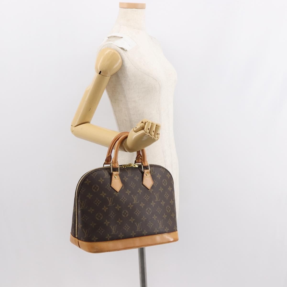 Louis Vuitton Alma Handbag Monogram Canvas