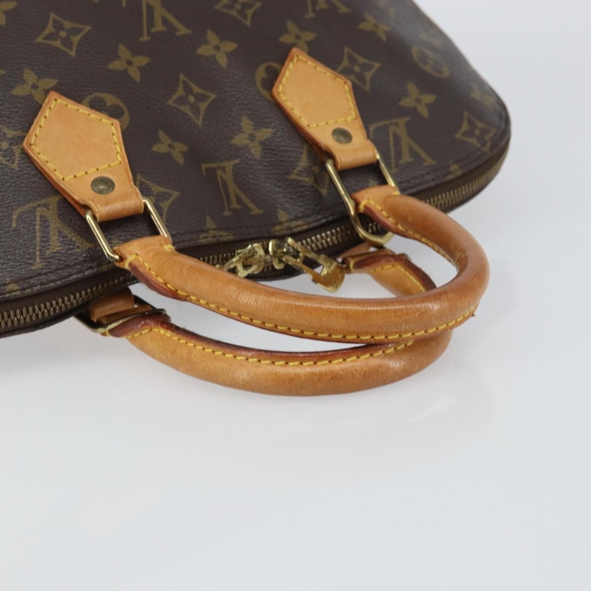 Louis Vuitton Alma Handbag Monogram Canvas