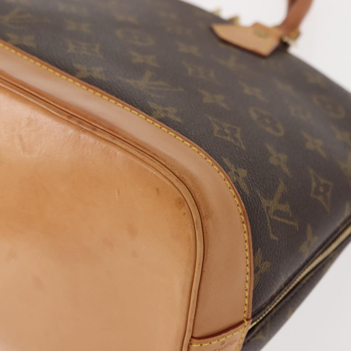 Louis Vuitton Alma Handbag Monogram Canvas