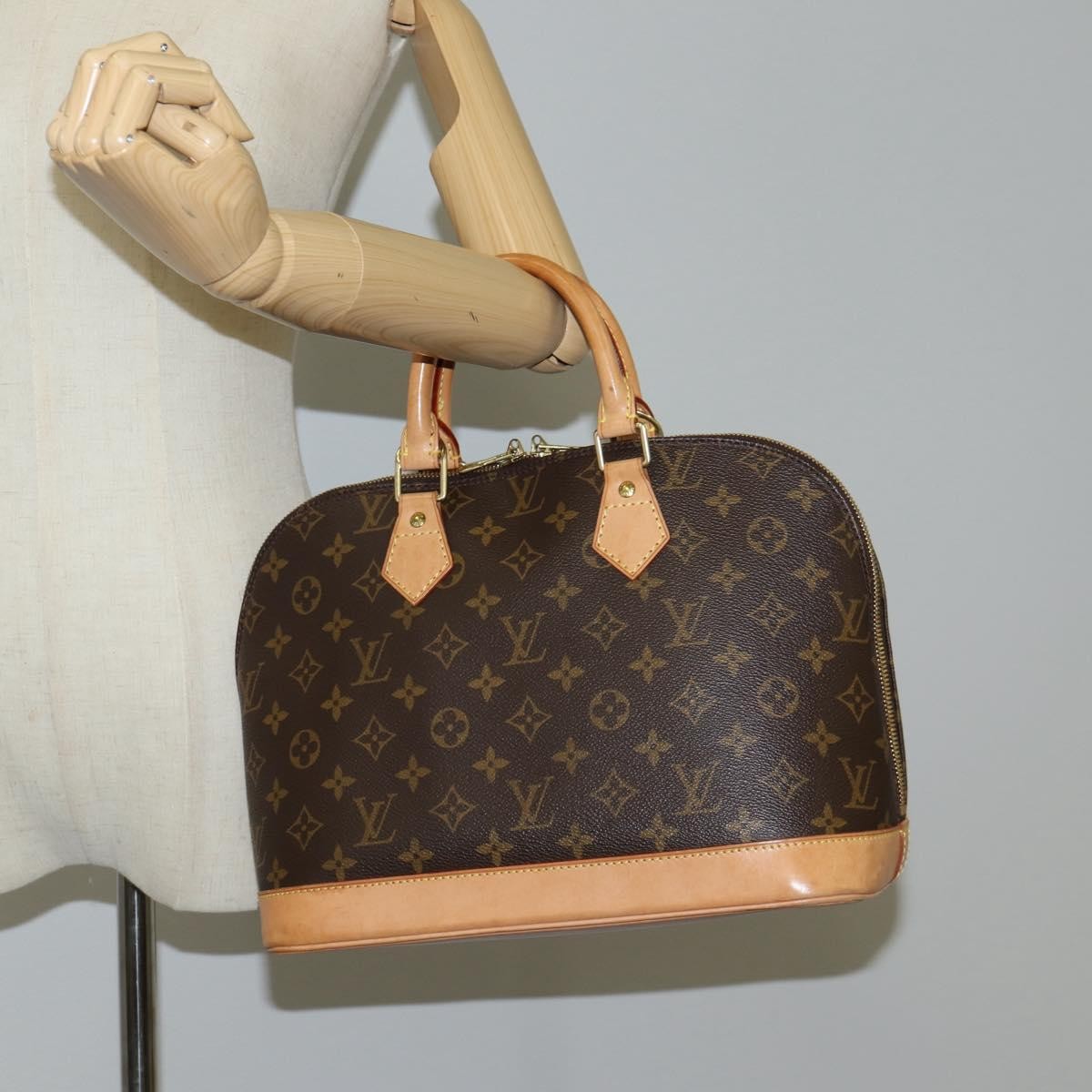 Louis Vuitton Alma Handbag Monogram Canvas
