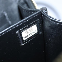 Chanel Filigree Vanity Clutch with Chain Quilted Caviar