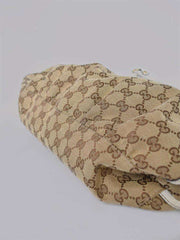 حقيبة عتيقة من مجموعة غوتشي قماش بني مع تقليم من الجلد الأبيض