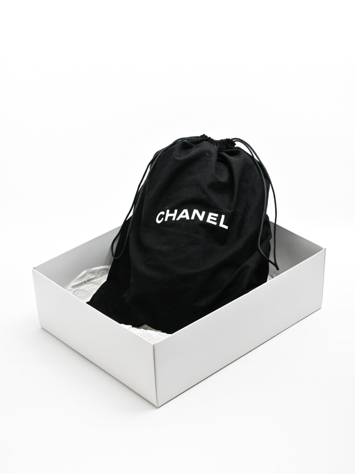 chanel dust bag black white